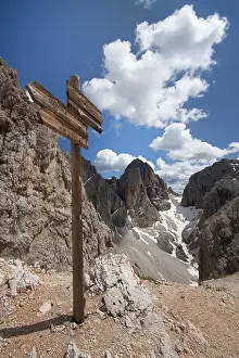 South Tyrol Italy Prints: Molignon pass with sign post, Dolomites range