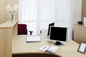 Modern Office Workspace Prints: Monitor on a desk in a modern office
