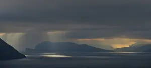 Cloudy Atmosphere Travel Photography Prints: Mood light with low-hanging clouds