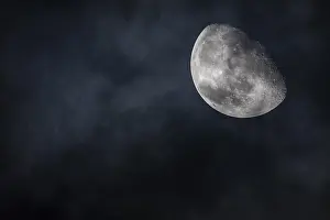 Cloudy Skies Of Austria Prints: Moon in the night sky with clouds