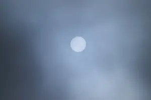 Cloudy Evening Sky Europe Prints: Moon shining through clouds at evening