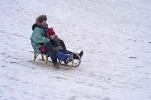Winter Sports Kids Prints: Mother and daughte on a sledge