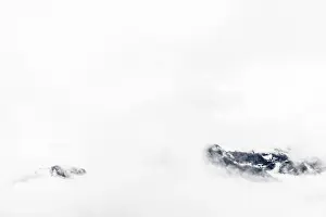 Tyrol Mountains Prints: Mountain peak rises from clouds