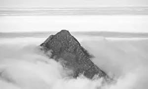 Uninhabited Mountain Top Scenery Prints: Mountain peaks above the clouds