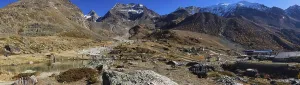 Mountainous Region Switzerland Prints: A mountain range under a clear blue sky