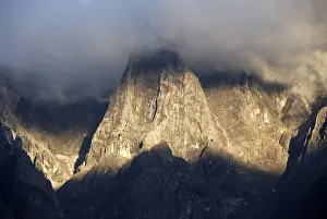 Jade Dragon Snow Mountain Prints: Mountain range in clouds, Alpenglow