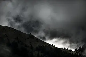 Overcast Sky Scenery Prints: Mountain ridge with dramatic clouds