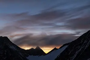 Dramatic Mountain Landscape Prints: Mountain ridge at sunrise with dramatic clouds
