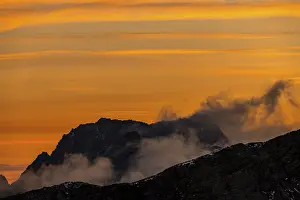 Dramatic Mountain Clouds Prints: Mountain ridge at sunrise with dramatic clouds