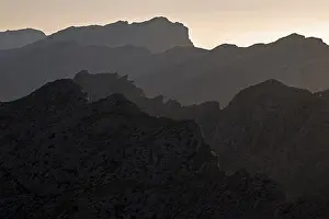 Balearic Islands Coastline Prints: Mountain silhouettes in backlight
