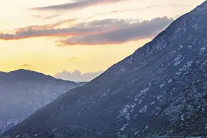 Orange Colored Sky At Sunset Prints: Mountain sunset and colored sky with clouds