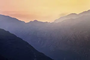 Mountain Sunset Prints: Mountain sunset and colored sky with clouds