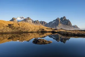 Stokksnes Headland Photo Prints: Mountains are reflected in a small lake