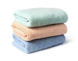 Cleanliness And Tidiness Image Prints: Multi Colored Towels on a white background