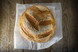 Kitchen Utensils Prints: Multi grain bread on a wooden table