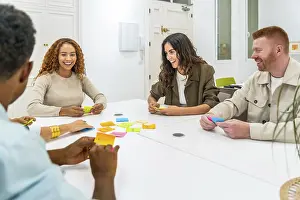 Diversity In The Workplace Prints: Multicultural colleagues collaborating in a modern office workshop