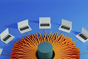 Artificial Intelligence Technology Prints: Multiple laptops surround a central data hub