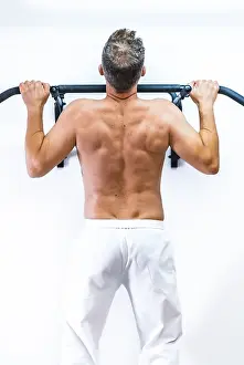 Physiotherapist Safety Measures Prints: Muscles of the patient doing a pull-up