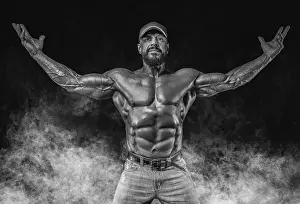 Muscular Bodybuilder Prints: Muscular athlete posing in the studio