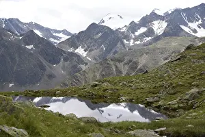 Cloudy Sky Mountain Range Prints: Mutterberger lakes, Mutterberger see