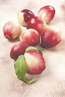 Red Fruit Photography Prints: Nectarine scattered on the table