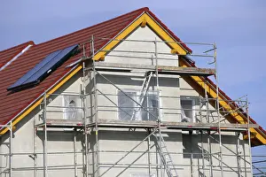New Home Construction Process Prints: New building with completed basic rendering of the exterior facade New building with completed basic rendering of