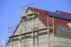 Residential Building Shell Prints: New building with completed basic rendering of the exterior facade New building with completed basic rendering of