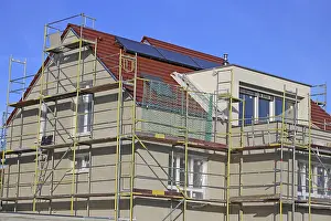 Residential Building Shell Construction Prints: New building with completed basic rendering of the exterior facade New building with completed basic rendering of