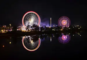 Southern Germany Fairground Ride Prints: Night shot, overview, reflection in the river Neckar