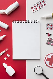 Empty Notepad Prints: Empty notepad surrounded by pills
