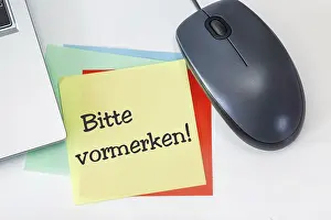 Workplace Communication Prints: Notepad with the words PLEASE NOTE ON a desk