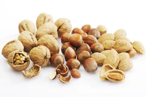 Food Photography Indoors Prints: Nuts: walnuts, hazelnuts and almonds
