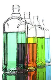 Studio Shot Of A Bottle Prints: Object on white - Bottle with liquid