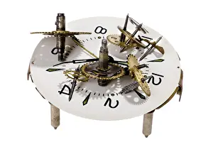 Studio Shot Of A Clock Prints: Object on white - tool clockwork close up