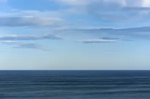 Blue Horizon View Prints: Ocean with cloudy blue sky