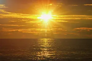 Rocky Coastline Landscape Prints: Ocean sunset with great cloudscape