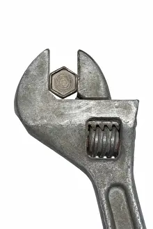 Construction Tool Prints: Old adjustable spanner with bolt isolated on white background
