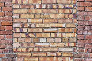 Brick Wall Background Image Prints: Old brick wall background texture with a window covered by different bricks