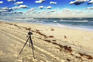 Sandy Beach Photography Prints: Old camera on the sandy beach