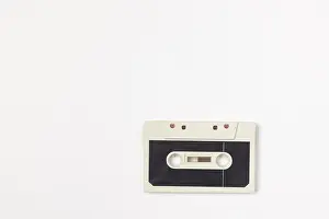 White Background Isolated Object Prints: Old compact cassette on white background
