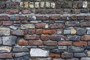 Historic Quarter Exterior View Prints: Old grungy stone wall. Texture and Background for your projects and creative work