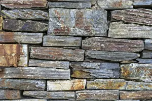 Historic Quarter Exterior View Prints: Old grungy stone wall. Texture and Background for your projects and creative work