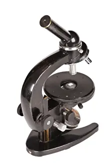 White Background Isolated Prints: Old microscope isolated on white background