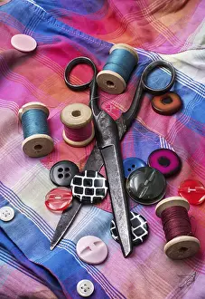 Embroidery Supplies Prints: Old scissors and thread and buttons on textured background fabric