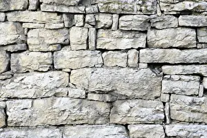 Deserted Rock Formation Europe Prints: Old stone wall out of shell limestone