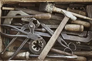 Rusty Wrenches Prints: Old suitcase with the different hand tools