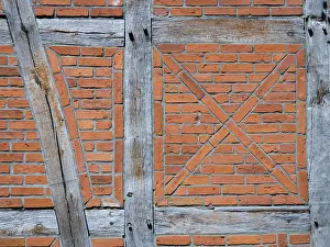Deserted Red Brick Structure Prints: Old wall made of brown half-timbered