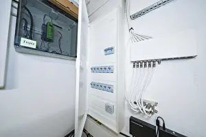 German Architecture Style Prints: Open electrical distributor in bright technical room