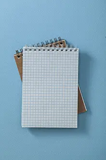 Office Supply Images Prints: Two Opened Note Pads On Blue Background