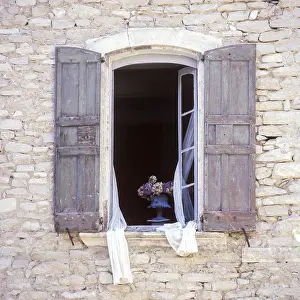 French Architecture Images Prints: Opened window with shutters in a stone facade